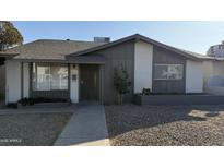 Charming single-story home with a well-maintained gravel yard and neutral exterior paint at 4217 W Medlock Dr, Phoenix, AZ 85019