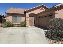 Charming single-story home with desert landscaping, a tile roof, and a two-car garage at 2125 E Danbury Rd, Phoenix, AZ 85022