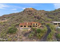 Charming hillside home featuring a private pool and stunning desert landscaping at 6349 E Hummingbird Ln, Paradise Valley, AZ 85253
