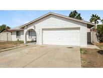 Charming single-story home features a two-car garage and well-maintained front yard at 9622 N 35Th Ln, Phoenix, AZ 85051