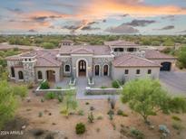 Stunning estate with desert landscaping, tile roof, stone accents and views for miles at 7254 E Sonoran Trl, Scottsdale, AZ 85266