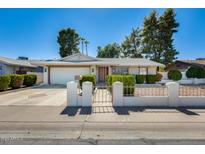 Charming single-story home featuring a well-maintained front yard and inviting curb appeal at 15608 N 57Th Dr, Glendale, AZ 85306