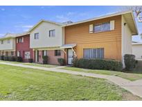 Charming townhome featuring a well-manicured lawn and inviting curb appeal at 6625 N 44Th Ave, Glendale, AZ 85301