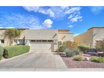 Charming single-story home with a well-manicured front yard and a two-car garage at 943 E Kortsen Rd # 10, Casa Grande, AZ 85122