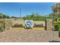 Allred Ranch community entrance sign with stone accents and desert landscaping at 2955 E Flossmoor Ave, Mesa, AZ 85204
