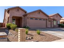 Charming single-story home featuring a two-car garage and low maintenance desert landscaping at 16818 S 23Rd St, Phoenix, AZ 85048