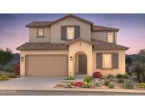 Charming two-story home featuring a tile roof, an attached garage, and desert landscaping at 18156 E Tiffany Dr, Queen Creek, AZ 85142