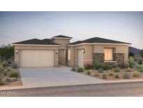 Charming single-story home with a three car garage and desert landscaping in a warm desert setting at 18225 E Colt Dr, Queen Creek, AZ 85142