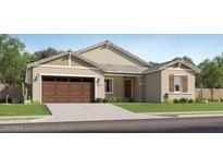 Charming single-story home featuring a two-car garage, neutral stucco, and well-maintained landscaping at 3780 E Gold Mountain Ave, San Tan Valley, AZ 85143