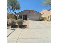 Charming single story home with desert landscaping and a two car garage at 23771 W Yavapai St, Buckeye, AZ 85326
