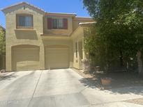 Charming two-story home with a two car garage and landscaped front yard at 3636 E Parkview Dr, Gilbert, AZ 85295