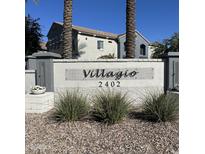 Community sign with address and view of buildings and palm trees in the Villagio neighborhood at 2402 E 5Th St # 1457, Tempe, AZ 85288