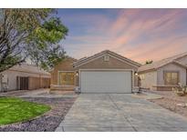Charming single-story home with a well-maintained front yard and a two-car garage at 3351 W Via Del Sol Dr, Phoenix, AZ 85027
