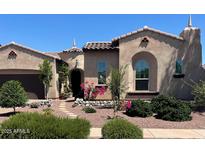 Charming single-story home with desert landscaping, stone accents, and tiled roof at 20502 W Ridge Rd, Buckeye, AZ 85396