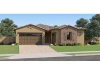 Charming single-story home features a two-car garage and a mix of stucco and stone accents at 23256 W Tamarisk Ave, Buckeye, AZ 85326