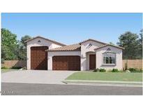 Charming single-story home featuring a three-car garage and a well-manicured front yard at 3160 E Craftsman Ln, San Tan Valley, AZ 85140