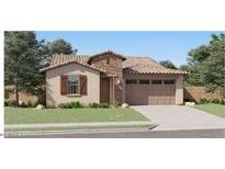 Charming single-story home featuring a neutral color palette, attached two-car garage, and a well-maintained lawn at 3283 E Ranchhand Dr, San Tan Valley, AZ 85140