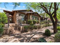 Charming single-story home with stone accents and a well-maintained front yard at 9262 E Desert Park Dr, Scottsdale, AZ 85255