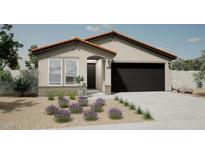 Charming single-story home featuring a desert-landscaped front yard and an attached two-car garage at 17962 W Sand Hills Rd, Surprise, AZ 85387