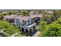 Beautiful, two-story home showcasing its tile roof and landscaped surroundings in a desirable neighborhood at 20437 W White Rock Rd, Buckeye, AZ 85396