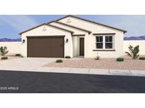 Charming single-story home featuring a two-car garage and desert landscaping at 16190 W Bajada Rd, Surprise, AZ 85387