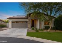 Charming single-story home with a two-car garage, desert landscaping, and a welcoming front porch at 20438 W Calle Encorvada --, Buckeye, AZ 85396