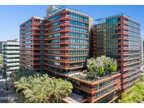 Modern multi-story building showcasing unique architectural design and lush rooftop greenery at 4808 N 24Th St # 1228, Phoenix, AZ 85016
