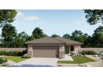 Charming single-story home featuring a two-car garage, desert landscaping, and a covered entryway at 32282 N Pony Express Rd, San Tan Valley, AZ 85143