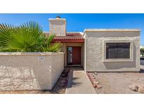Inviting home entrance with desert landscaping and unique architectural details at 633 W Southern Ave # 1181, Tempe, AZ 85282