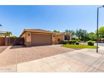 Charming single-story home featuring a paved driveway and well-manicured landscaping at 1229 W Sycamore Rd, Queen Creek, AZ 85140