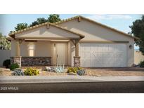 Charming single-story home with a well-manicured lawn and a two-car garage at 17524 W Woodlands Ave, Goodyear, AZ 85338