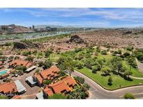 Expansive aerial view showcases the property's proximity to the waterfront and scenic desert landscape at 609 E Mesquite Cir # D132, Tempe, AZ 85288
