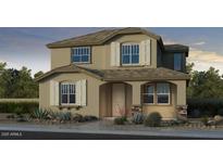 Charming two-story home featuring classic architectural design with neutral colors and symmetrical windows at 9954 W Piccadilly Rd, Avondale, AZ 85392