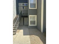 Charming condo exterior featuring well-maintained stairs and neutral color scheme at 255 S Kyrene Rd # 139, Chandler, AZ 85226