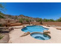 Backyard pool and jacuzzi with desert views at 11238 N 11Th St, Phoenix, AZ 85020