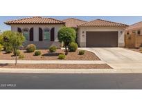 Charming single-story home with a well-manicured front yard and a two-car garage at 2750 W Pollack St, Phoenix, AZ 85041