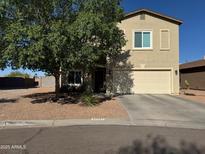 Well-maintained two-story home featuring a xeriscaped front yard and an attached two-car garage at 30394 N Appalachian Trl, San Tan Valley, AZ 85143