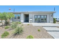 Charming single-story home showcasing modern architecture and desert landscaping at 3310 E Valleyhigh Trl, San Tan Valley, AZ 85143