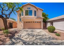 Charming two-story home with a well-maintained front yard and two car garage, perfect for a Gathering at 16626 N 20Th St, Phoenix, AZ 85022