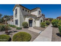 Charming home featuring a stucco exterior, tiled roof, and low-maintenance desert landscaping at 26505 N Babbling Brook Dr, Phoenix, AZ 85083