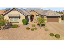 Stunning home with a well-manicured yard, neutral color palette, stone accents and a two-car garage at 42161 N Via Cienna --, San Tan Valley, AZ 85140