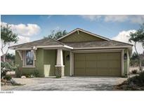 Charming single-story home with a two-car garage and desert landscaping at 14903 N 55Th Dr, Glendale, AZ 85306
