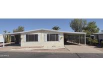 Charming home with covered carport and well-maintained landscaping in a desirable neighborhood at 3104 E Broadway Rd # 268, Mesa, AZ 85204