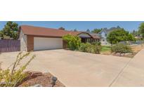 Charming single Gathering home with a spacious driveway and well-maintained landscaping in a suburban neighborhood at 428 S Sunnyvale --, Mesa, AZ 85206