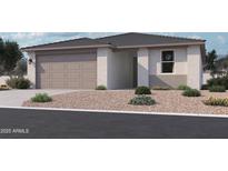 Charming single-story home with a two-car garage and well-maintained landscaping at 15789 W Beryl Ave, Waddell, AZ 85355