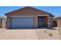 Charming single-story home featuring a blue garage door and modern architectural details at 4195 W Lisa Ln, San Tan Valley, AZ 85144