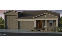 Charming single-Gathering home with a three-car garage and neutral color palette at 17832 W San Miguel Ave, Litchfield Park, AZ 85340