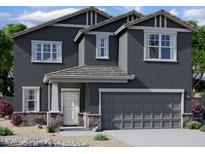 Charming two-story home with a gray exterior, covered entry, and a two-car garage at 1932 E Night Rider Rd, San Tan Valley, AZ 85140