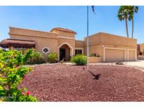 Charming single-story home with a well-maintained desert landscaped front yard and a spacious two-car garage at 15630 N 20Th St, Phoenix, AZ 85022