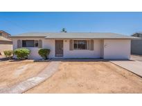 Charming single-story home featuring a well-maintained yard and a classic design at 3423 W Bloomfield Rd, Phoenix, AZ 85029